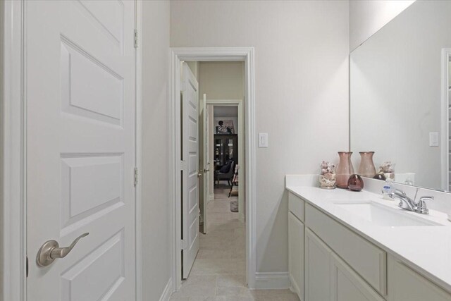 bathroom featuring tile patterned floors and vanity