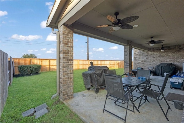 view of patio / terrace featuring ceiling fan and a grill