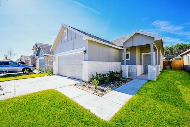 view of front facade with a garage and a front lawn