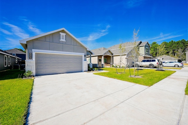5314 Seymour Dr, Houston, TX 77032 - ranch-style home featuring board and batten siding, a front yard, concrete driveway, and a garage