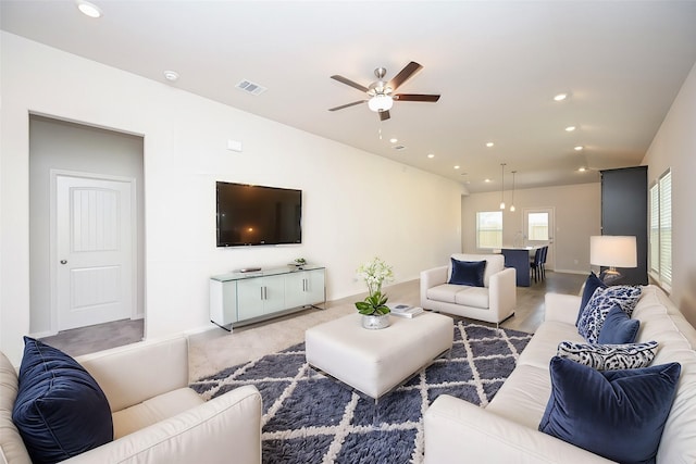 living room featuring ceiling fan