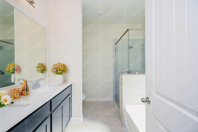 full bathroom with separate shower and tub, tile patterned floors, vanity, and toilet