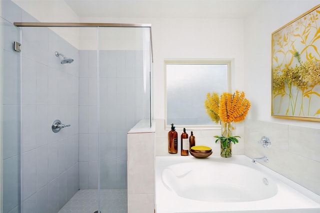 bathroom with independent shower and bath