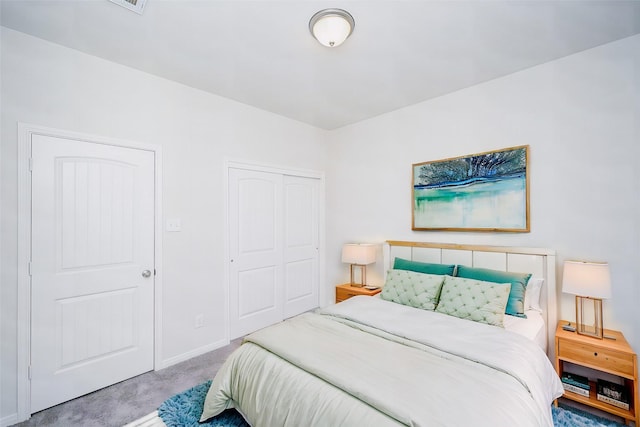 bedroom featuring light colored carpet