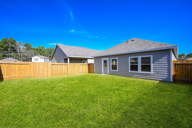 5314 Seymour Dr, Houston, TX 77032 - rear view of house featuring a fenced backyard and roof with shingles