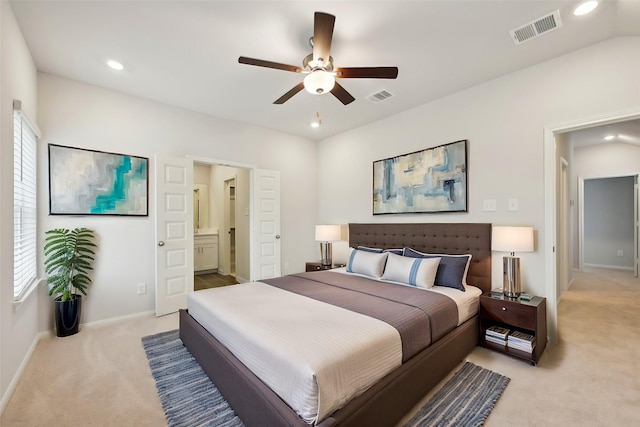 bedroom with ceiling fan, multiple windows, and light carpet