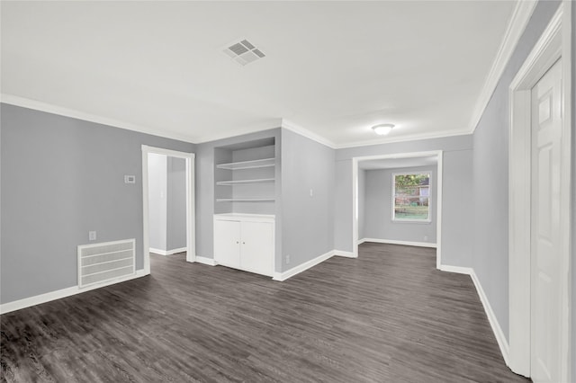 unfurnished living room with ornamental molding and dark wood-type flooring