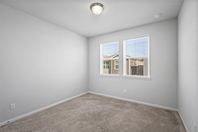 view of carpeted spare room