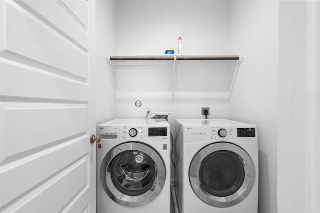 laundry area with washer and dryer