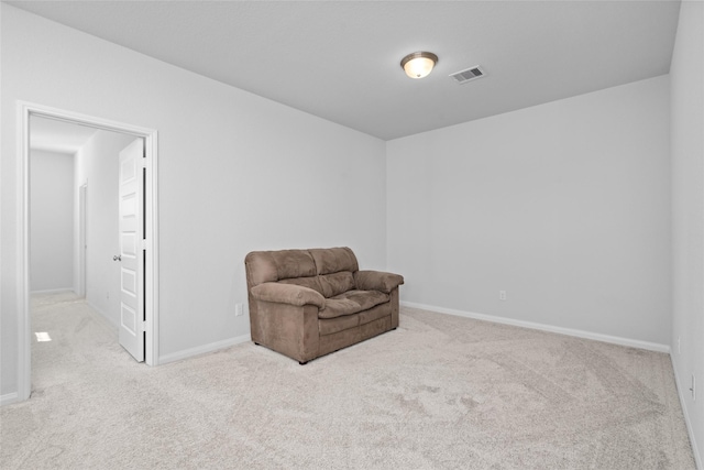 living area with carpet floors