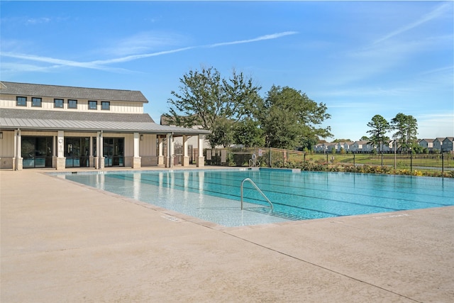 view of pool featuring a patio