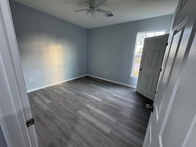 entrance foyer featuring ceiling fan and dark hardwood / wood-style flooring