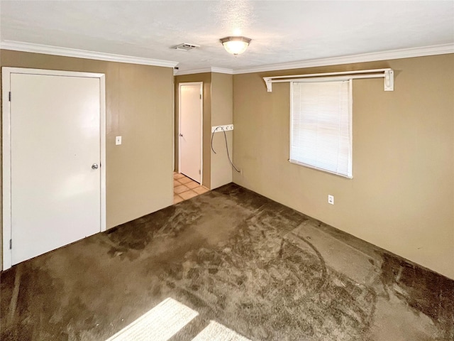 unfurnished bedroom featuring ornamental molding and light carpet