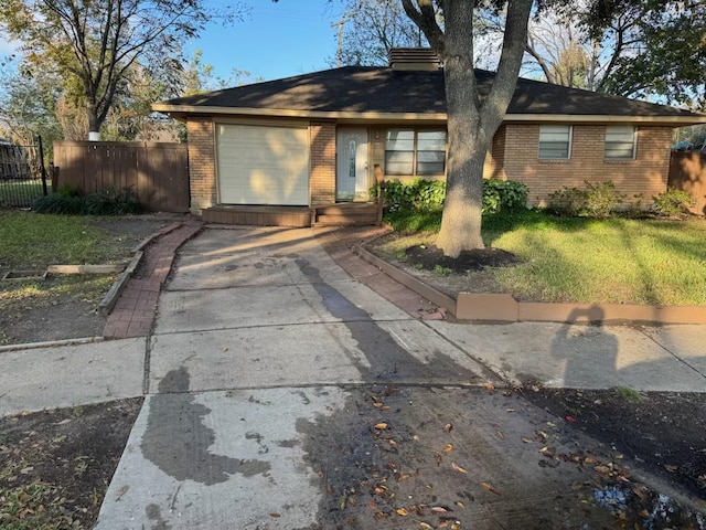 single story home featuring a garage