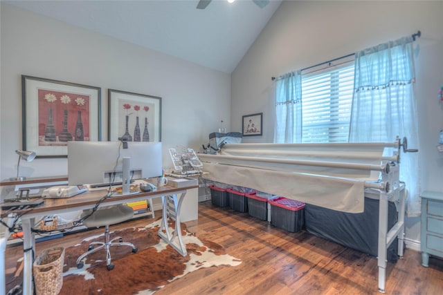 office area with ceiling fan, dark hardwood / wood-style flooring, and high vaulted ceiling