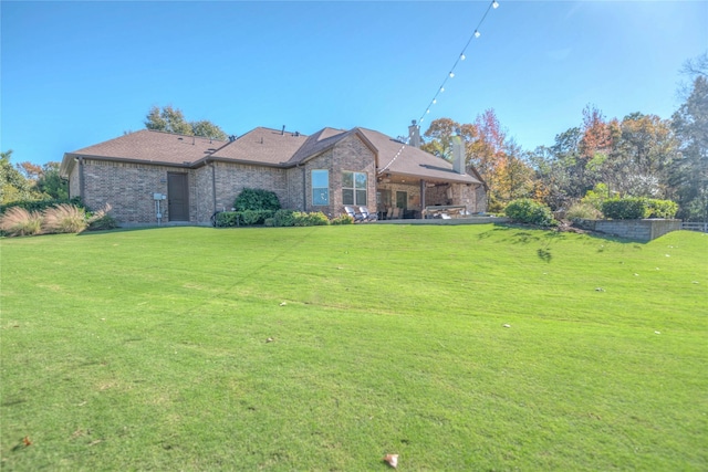 view of front of home with a front yard