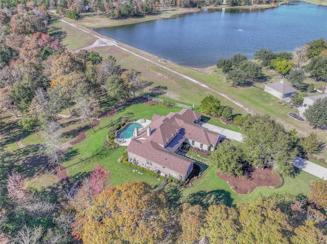 birds eye view of property featuring a water view