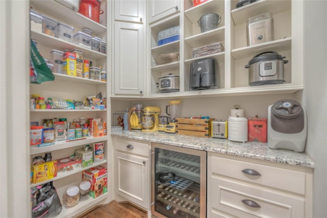 pantry featuring beverage cooler