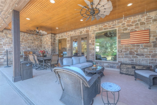 view of patio / terrace featuring outdoor lounge area, ceiling fan, and french doors