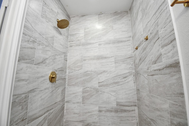 details with a tile shower