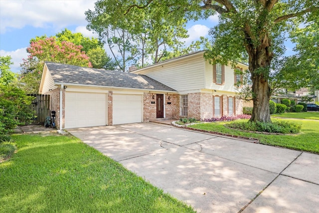 view of front facade featuring a garage and a front yard