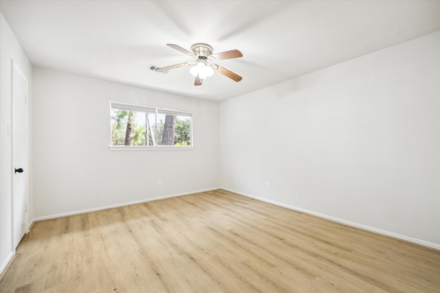 unfurnished room featuring light wood-type flooring and ceiling fan