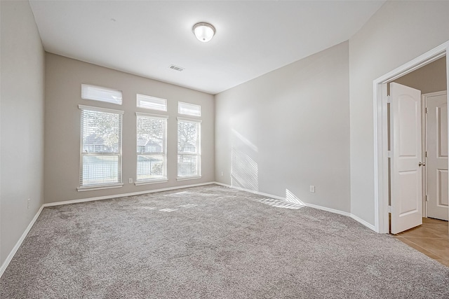 view of carpeted spare room