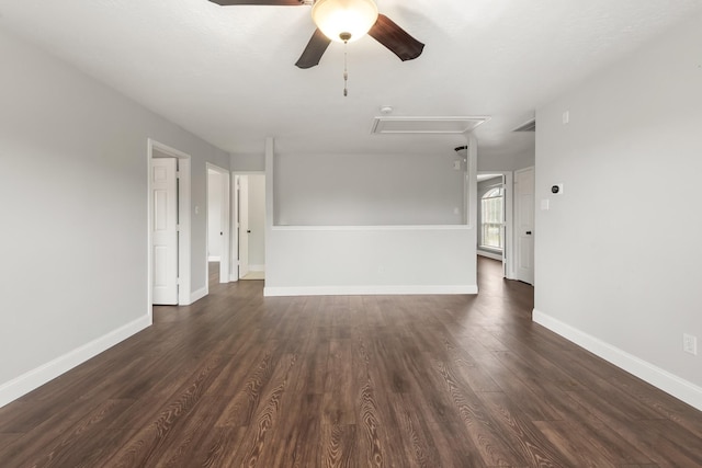 spare room with ceiling fan and dark hardwood / wood-style flooring