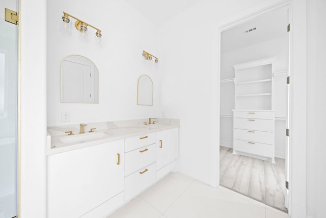 bathroom featuring vanity and tile patterned floors