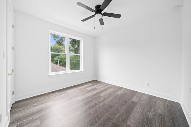 empty room featuring hardwood / wood-style flooring and ceiling fan