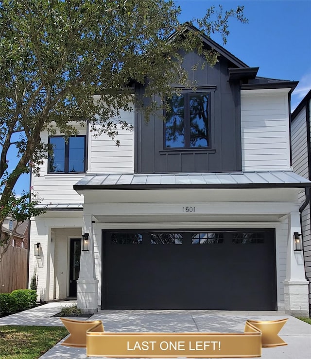 view of front of property featuring a garage