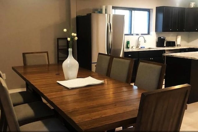 dining area featuring sink