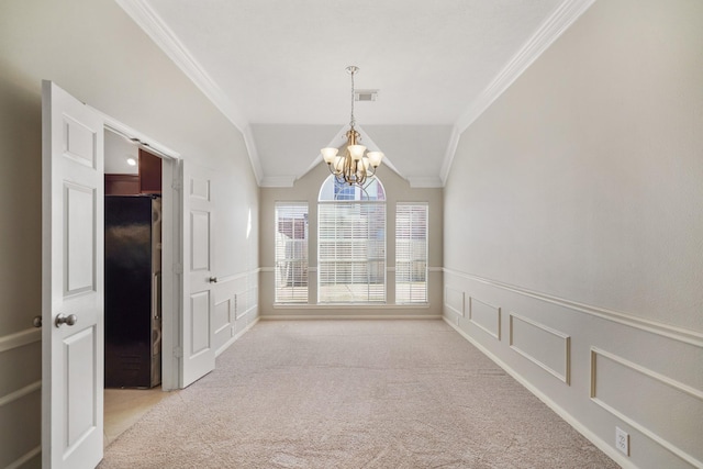 unfurnished room with a notable chandelier, light colored carpet, crown molding, and vaulted ceiling