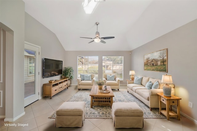 tiled living room featuring vaulted ceiling and ceiling fan