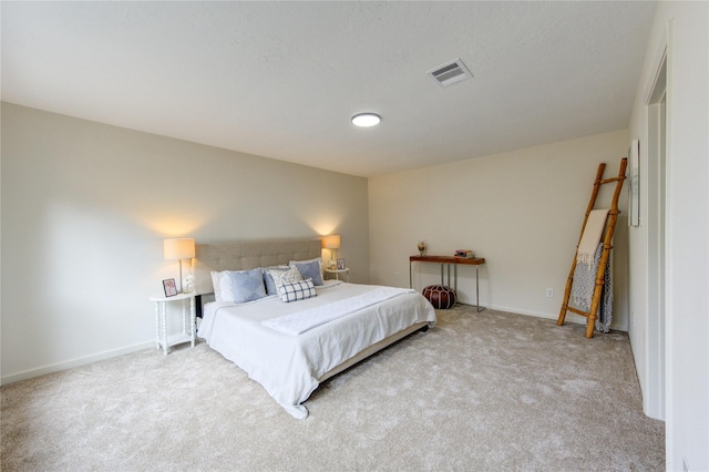 bedroom with light carpet