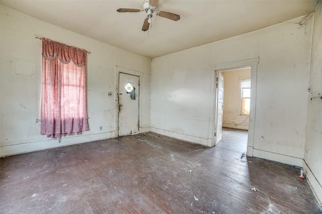 foyer entrance with ceiling fan