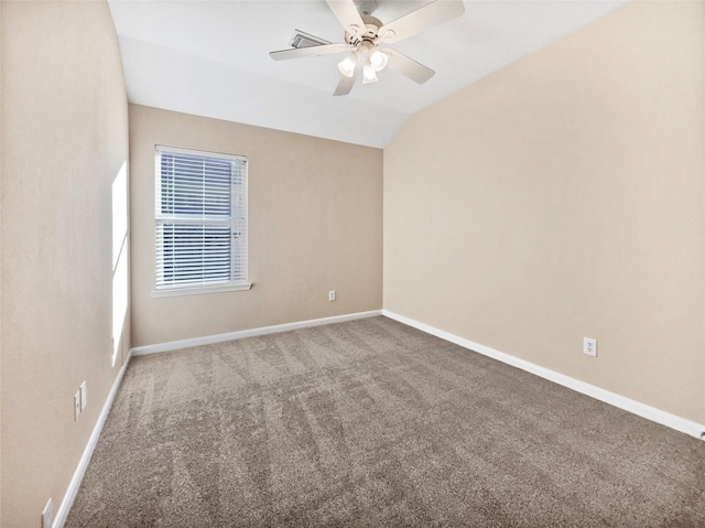 spare room with carpet flooring, ceiling fan, and lofted ceiling