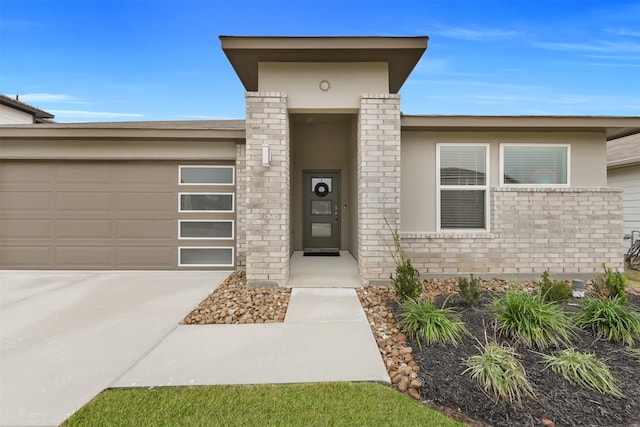 entrance to property featuring a garage