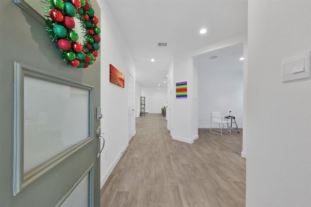 hall featuring light hardwood / wood-style floors