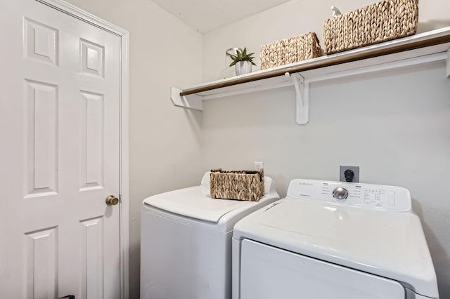 laundry room featuring independent washer and dryer