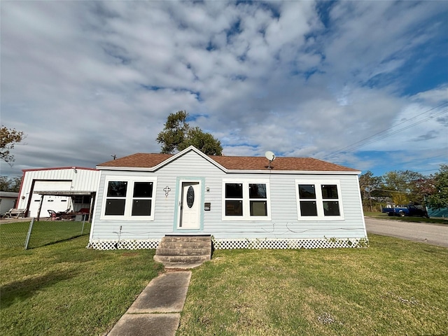 view of front of property with a front lawn