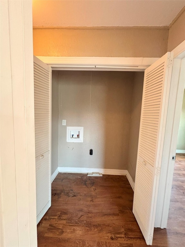 washroom featuring washer hookup and dark wood-type flooring