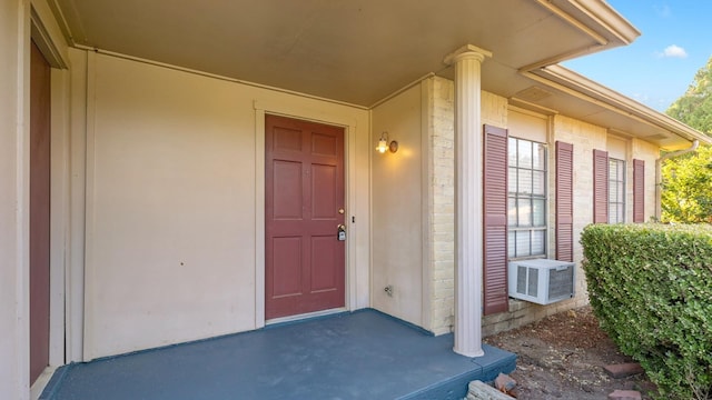 doorway to property with cooling unit