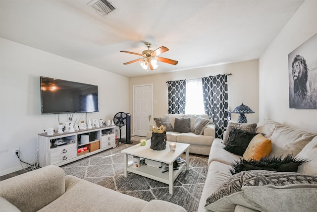 living room featuring ceiling fan