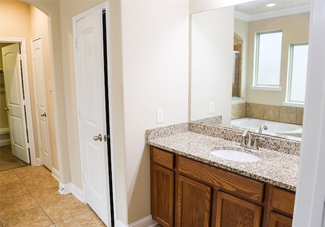 bathroom with shower with separate bathtub, vanity, tile patterned floors, and ornamental molding