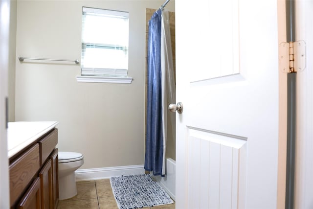 full bathroom featuring toilet, shower / tub combo, vanity, and tile patterned flooring