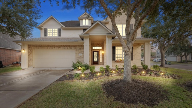 view of front of house with a garage