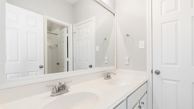 bathroom featuring vanity and walk in shower