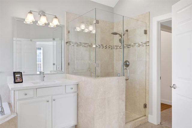 bathroom with vanity and walk in shower