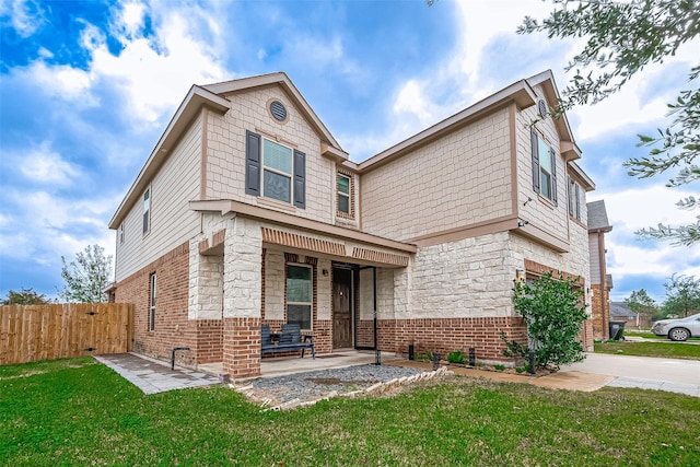 view of front of home with a front lawn